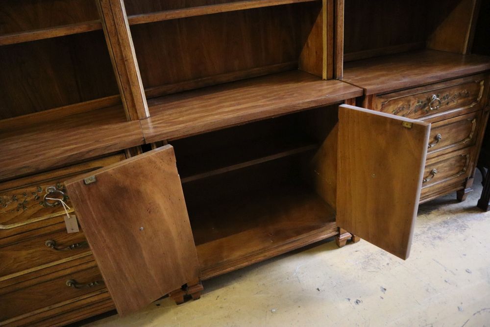 Three American stencilled walnut cabinets, total width 270cm, depth 44cm, height 181cm